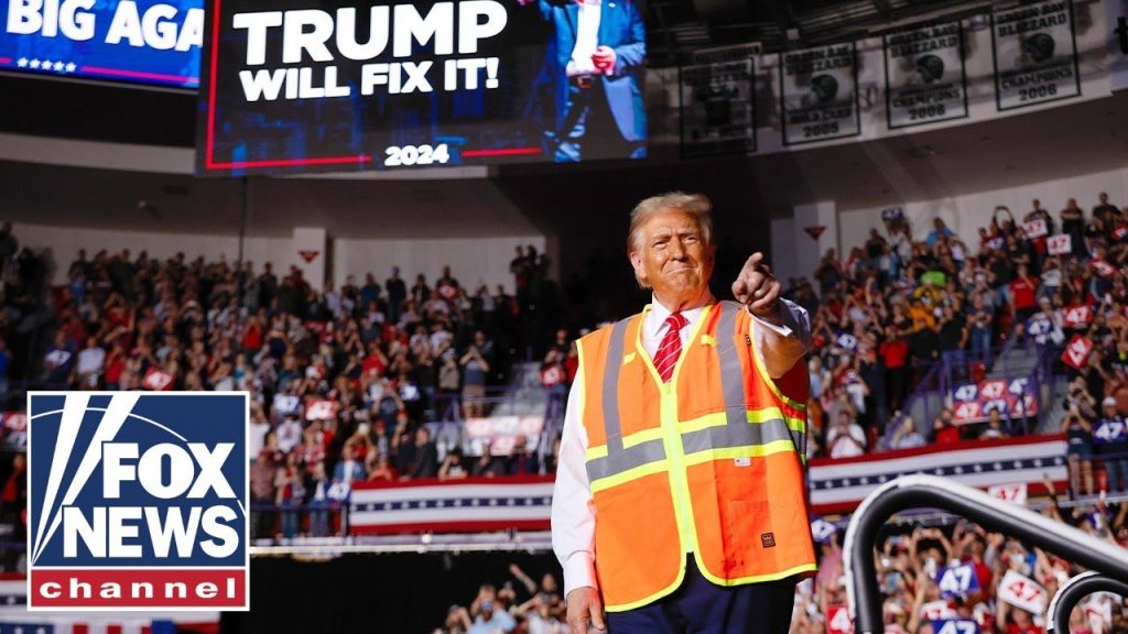 Crowd ERUPTS after Trump jokes about wearing sanitation vest